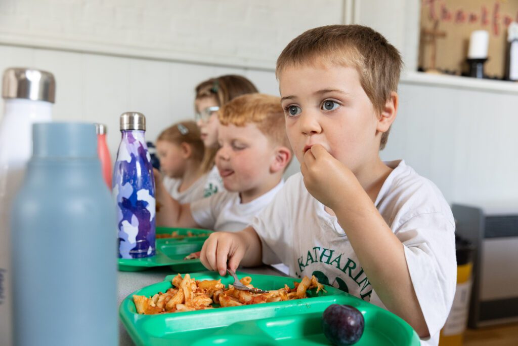 boy eating school lunch